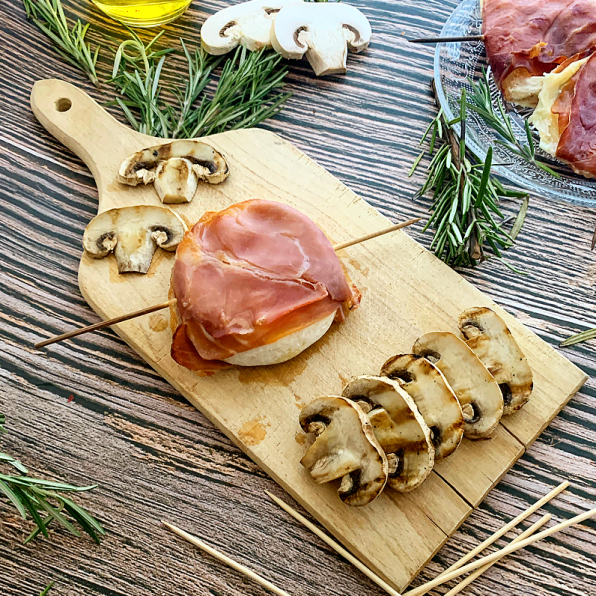 tomino al forno con prosciutto crudo